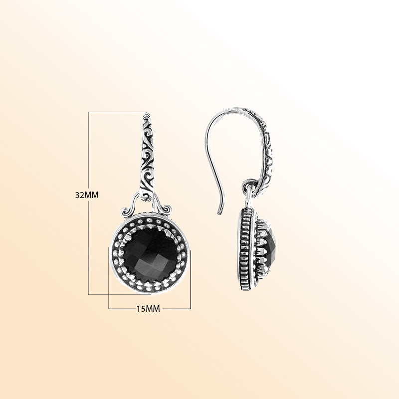 Sterling silver artisan earrings with round Black Onyx and handcrafted metal detailing.