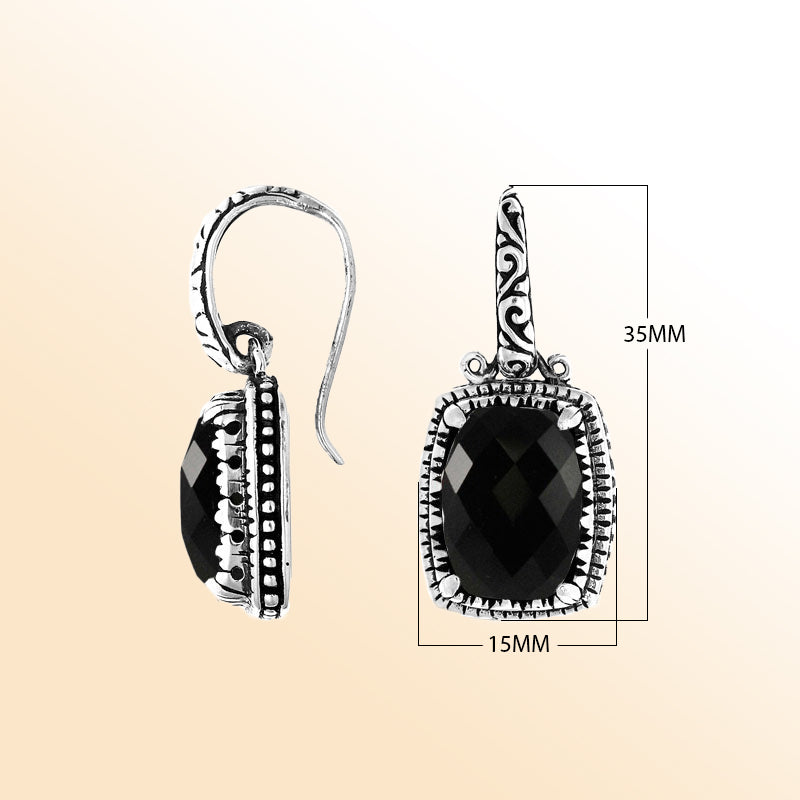 Sterling silver cushion-shaped artisan earrings with Black Onyx and carved detailing.