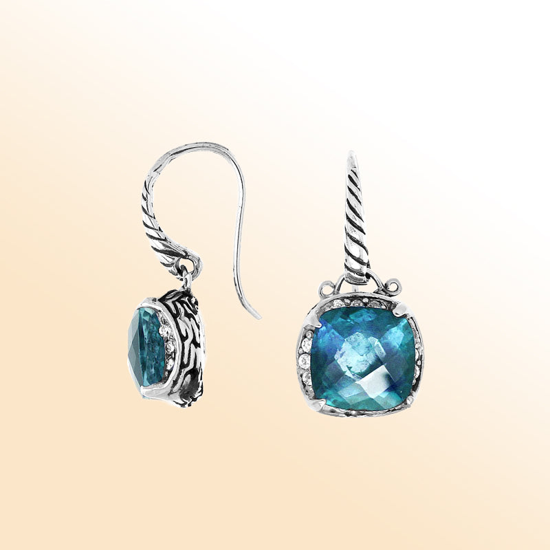 Sterling silver artisan earrings with Blue Topaz Quartz and Cubic Zirconia in a cushion-style setting.