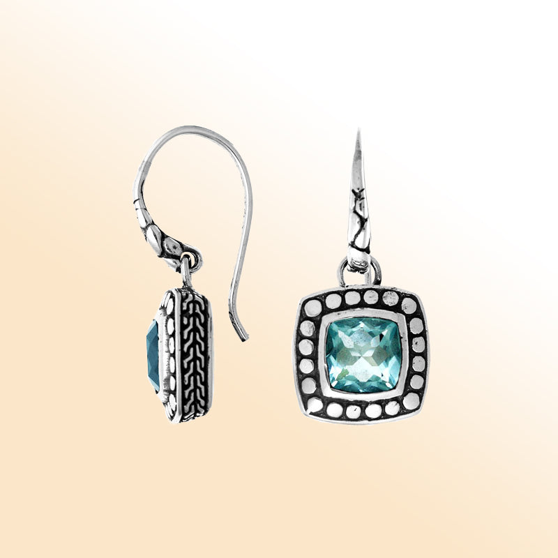 Sterling silver artisan earrings with square Blue Topaz Quartz and beaded frame design.
