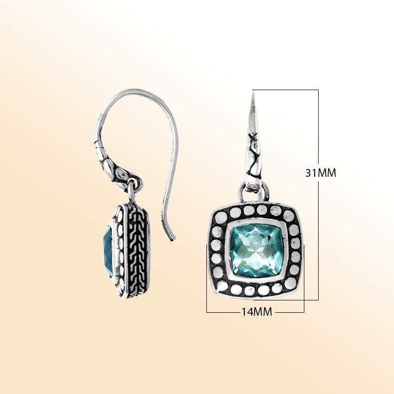 Sterling silver artisan earrings with square Blue Topaz Quartz and beaded frame design.