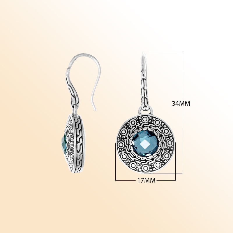 Sterling silver artisan round earrings with Blue Topaz Quartz and intricate patterned frame.