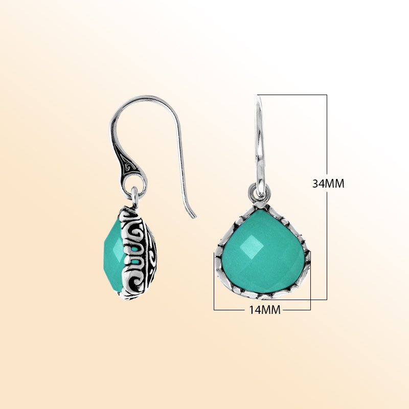 Sterling silver artisan teardrop earrings with Green Chalcedony Quartz and carved detailing.