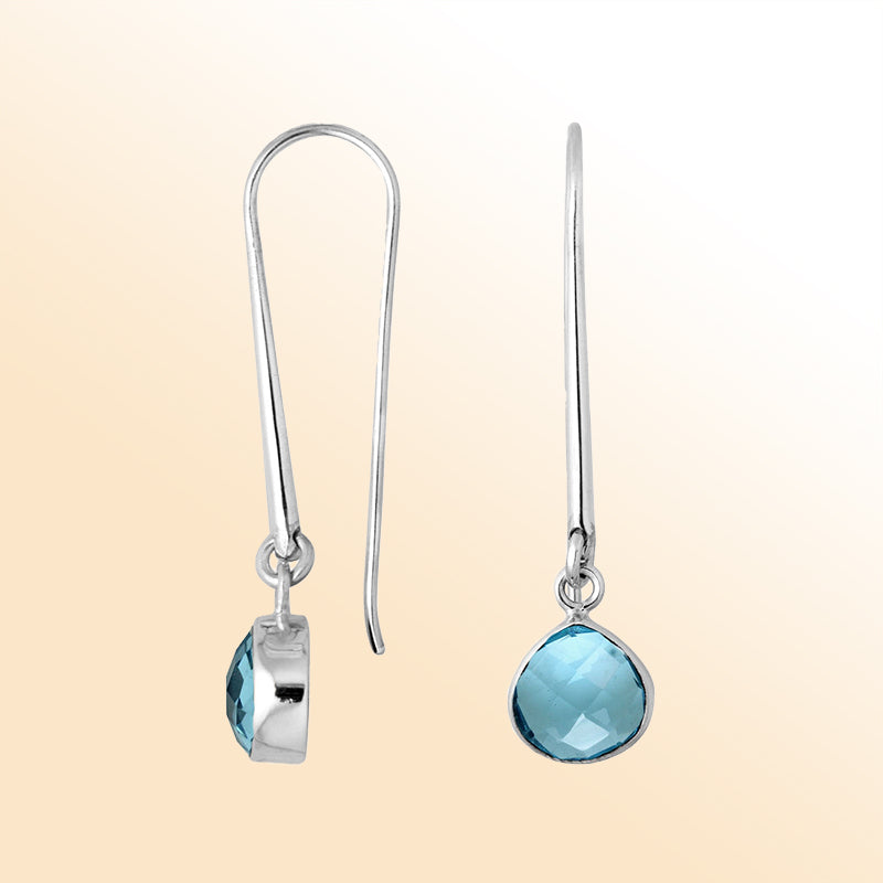Handcrafted sterling silver drop earrings featuring pear-cut Blue Topaz Quartz stone