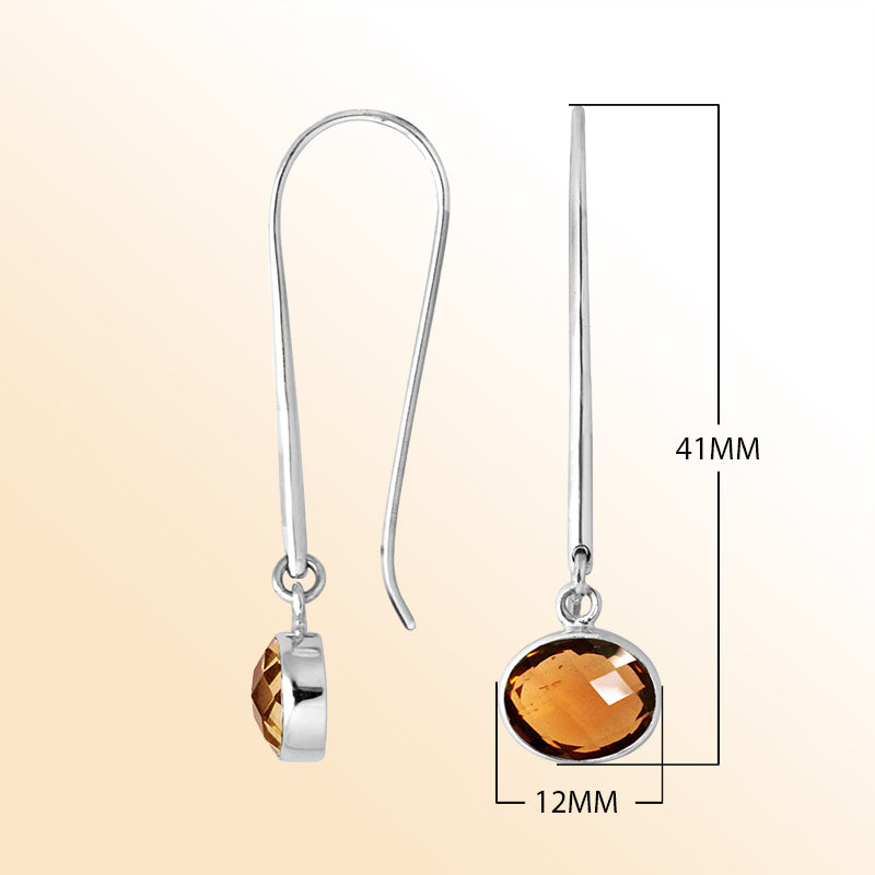 Handcrafted sterling silver drop earrings featuring oval-cut Citrine Quartz stone