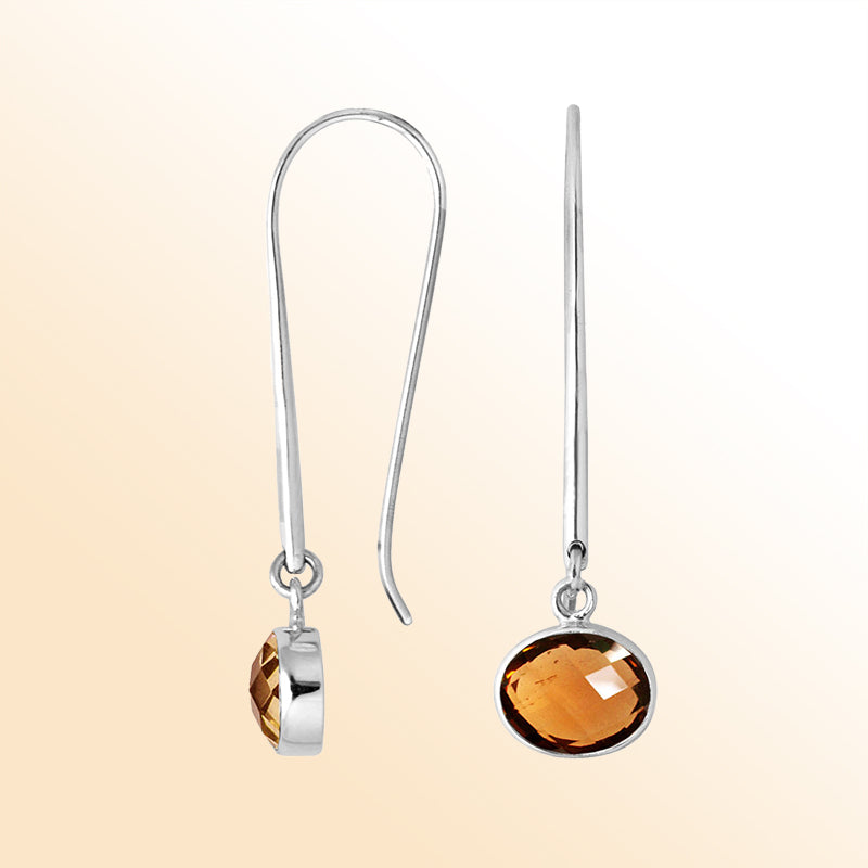 Handcrafted sterling silver drop earrings featuring oval-cut Citrine Quartz stone
