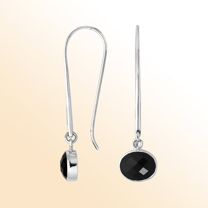 Handcrafted sterling silver drop earrings featuring oval-cut Black Onyx stone