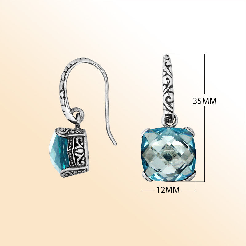 Handcrafted sterling silver drop earrings featuring cushion-cut Blue Topaz Quartz