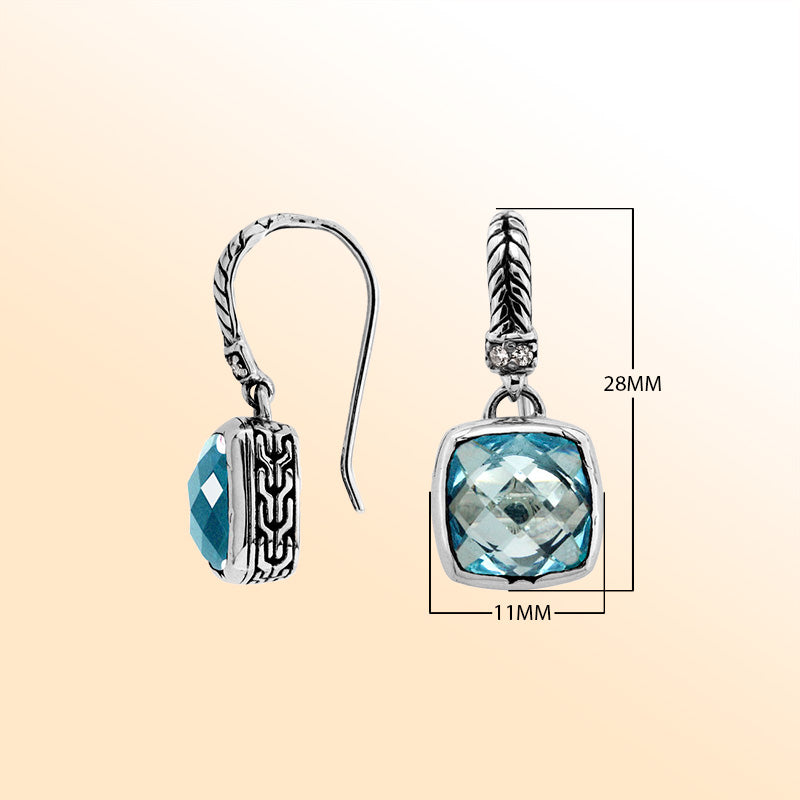 Handcrafted sterling silver drop earrings featuring Blue Topaz Quartz and Cubic Zirconia