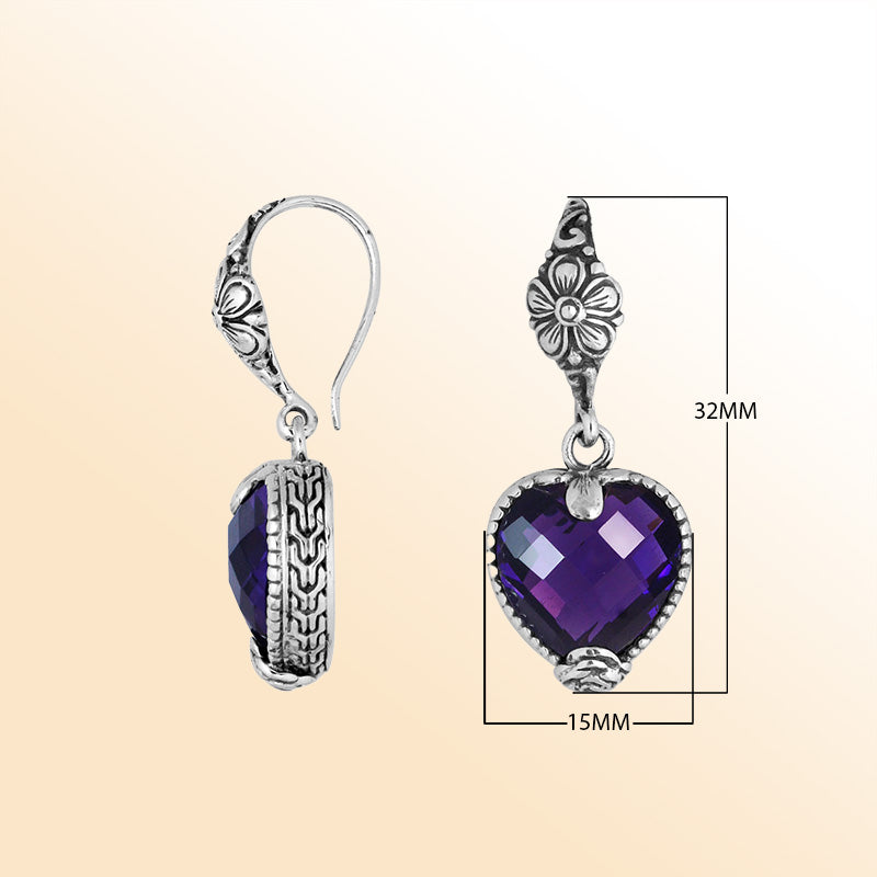 Sterling silver Amethyst Quartz oval earrings with antique oxidized finish, scroll design, and earwire lock.