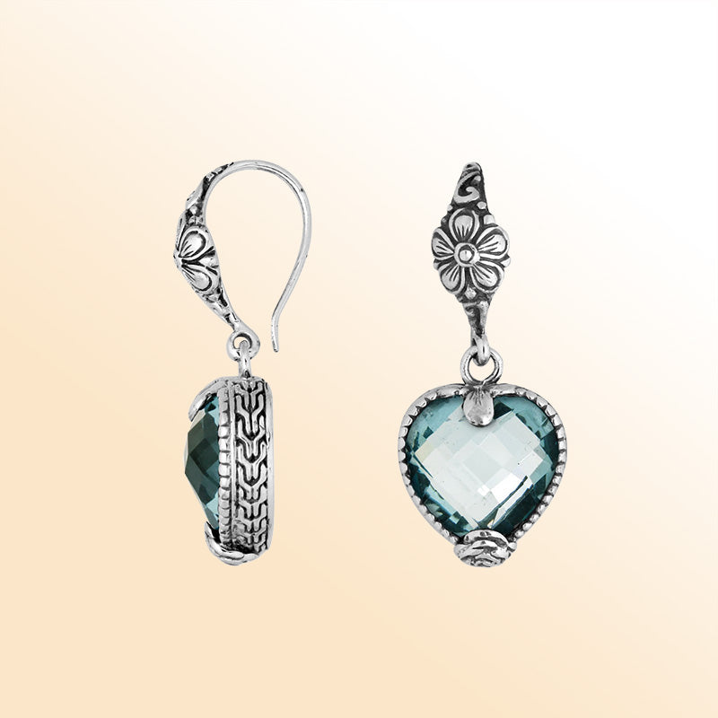 Sterling silver Blue Topaz Quartz heart earrings with antique oxidized finish, floral detailing, and earwire lock.