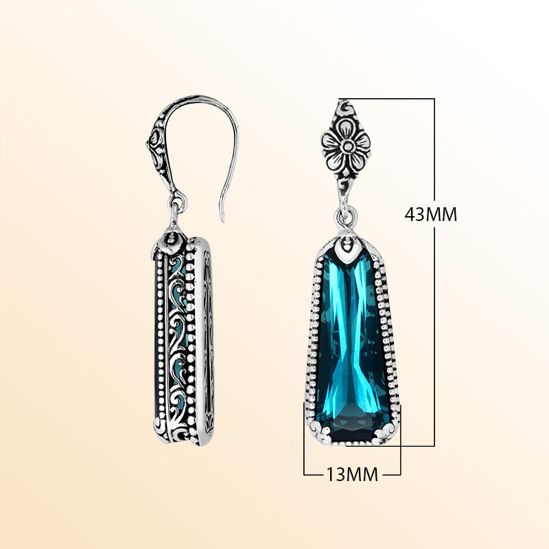 Sterling silver London Blue Topaz Quartz long earrings with antique oxidized finish, oceanic blue tone, and earwire lock.