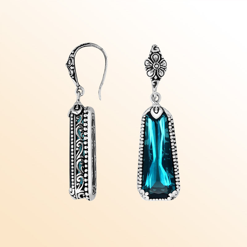 Sterling silver London Blue Topaz Quartz long earrings with antique oxidized finish, oceanic blue tone, and earwire lock.