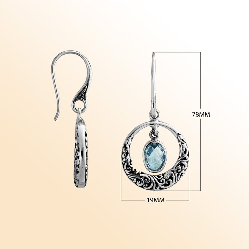 Sterling silver Blue Topaz Quartz round filigree drop earrings with oxidized finish and earwire lock.