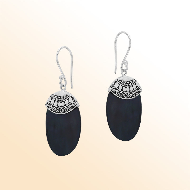 Artisan sterling silver earrings with Black Shell ovals and a decorative ornate patterned silver cap.