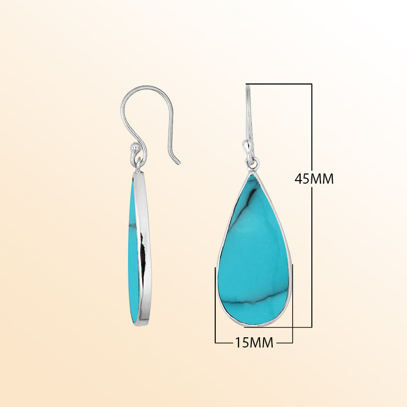 Artisan sterling silver earrings with vivid Turquoise Shell teardrops set in smooth polished bezel frames.