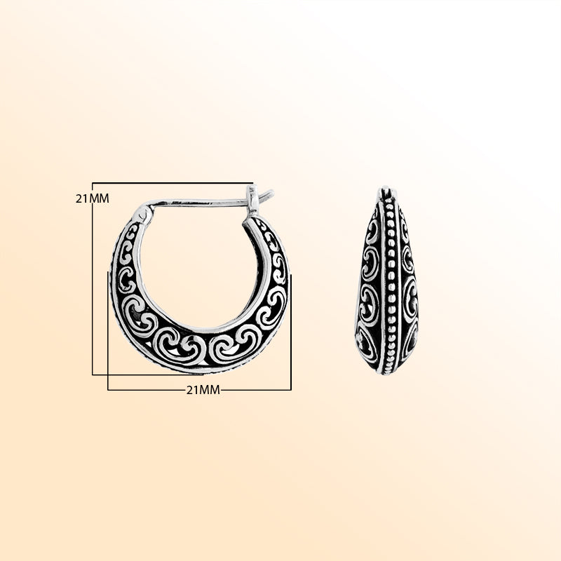 Artisan Sterling Silver swirl-pattern hoop earrings with oxidized detailing and beaded accents.