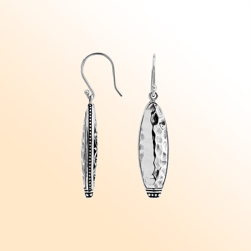Artisan Sterling Silver hammered marquise earrings with polished finish and beaded accents.