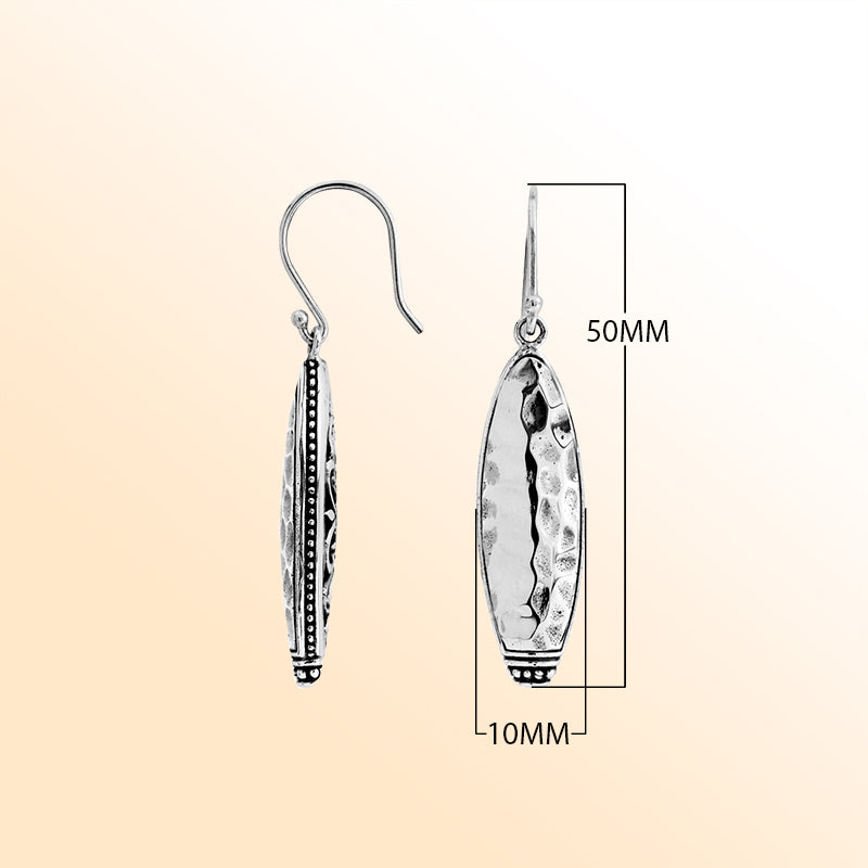 Artisan Sterling Silver hammered marquise earrings with polished finish and beaded accents.