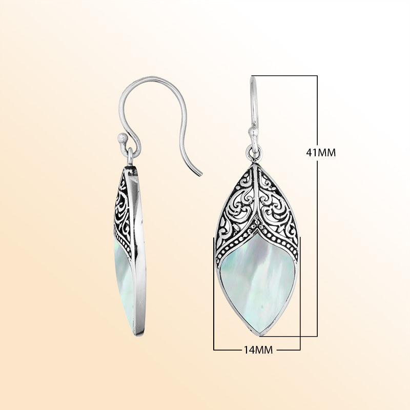 Artisan sterling silver marquise earrings with luminous Mother Of Pearl framed by ornate detailing.