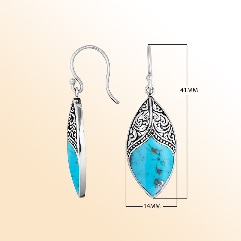 Artisan sterling silver marquise earrings featuring bright Turquoise Shell with ornate decorative framing.