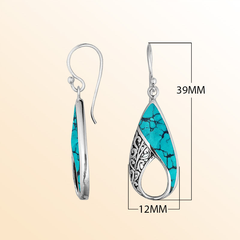 Sterling Silver Turquoise Shell teardrop earrings with artistic filigree swirl design, earwire lock, and polished finish handcrafted in Bali.