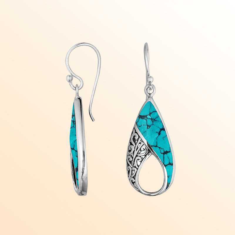 Sterling Silver Turquoise Shell teardrop earrings with artistic filigree swirl design, earwire lock, and polished finish handcrafted in Bali.