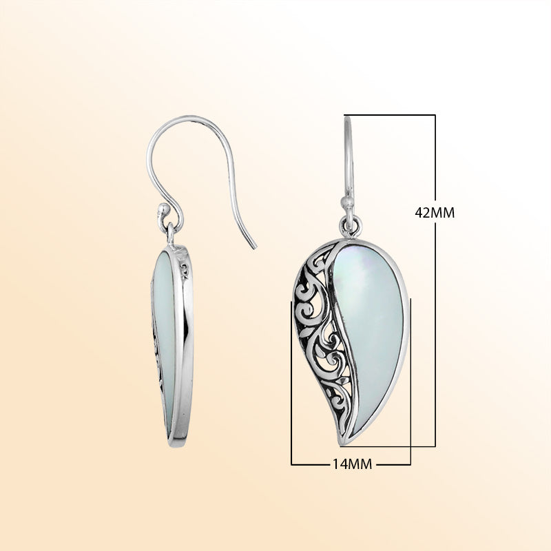A stunning pair of 925 sterling silver earrings featuring teardrop Mother Of Pearl stones with detailed Balinese filigree design and secure earwire hooks for women.