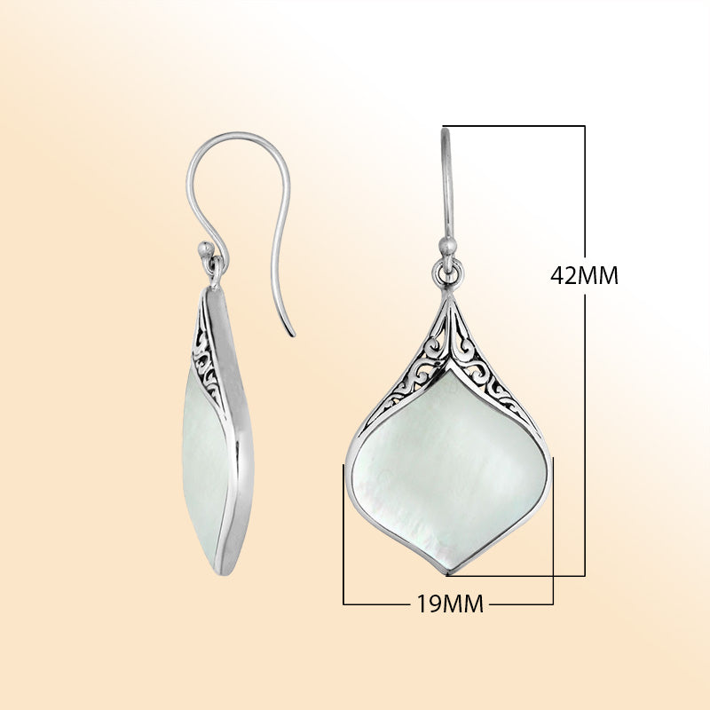 Artistic teardrop earrings with Mother Of Pearl and silver filigree work