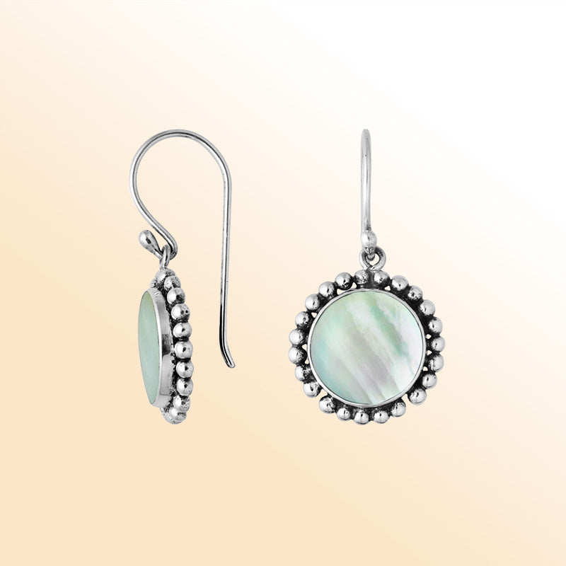 Sterling silver round Mother Of Pearl earrings with beaded border handcrafted by artisans