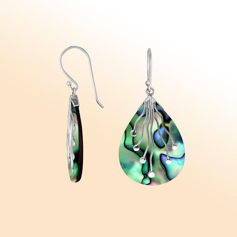 Sterling silver teardrop Abalone Shell earrings with flowing silver detailing handcrafted by artisans