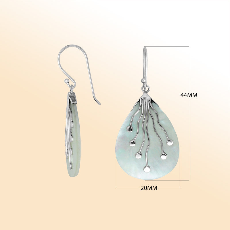 Sterling silver teardrop Mother Of Pearl earrings with artistic silver detailing handcrafted by artisans