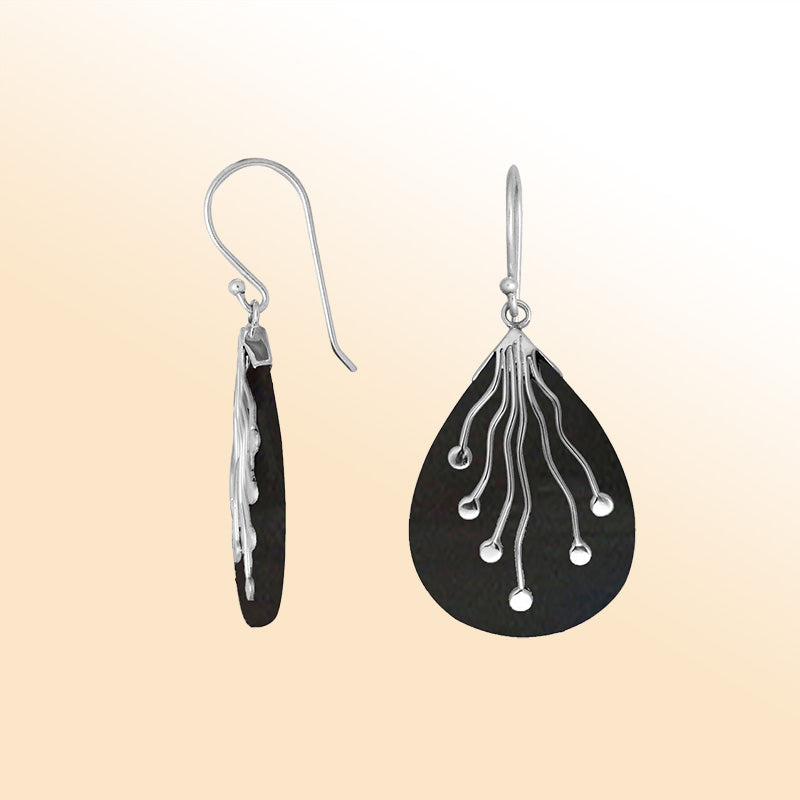 Artistic sterling silver earrings with dancing tendrils flowing over glossy Black Shell teardrops.
