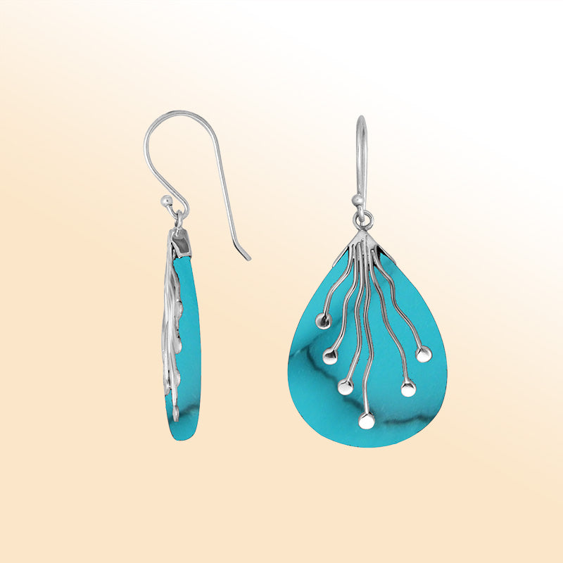 Sterling silver teardrop Turquoise Shell earrings with artistic silver detailing handcrafted by artisans