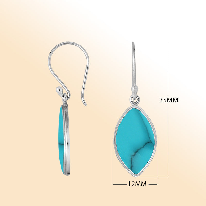 Artisan marquise earrings showcasing bold Turquoise Shell set in polished handcrafted sterling silver.