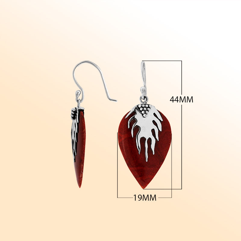 Artisan sterling silver leaf earrings with vivid Red Coral and flowing handcrafted silver detail.