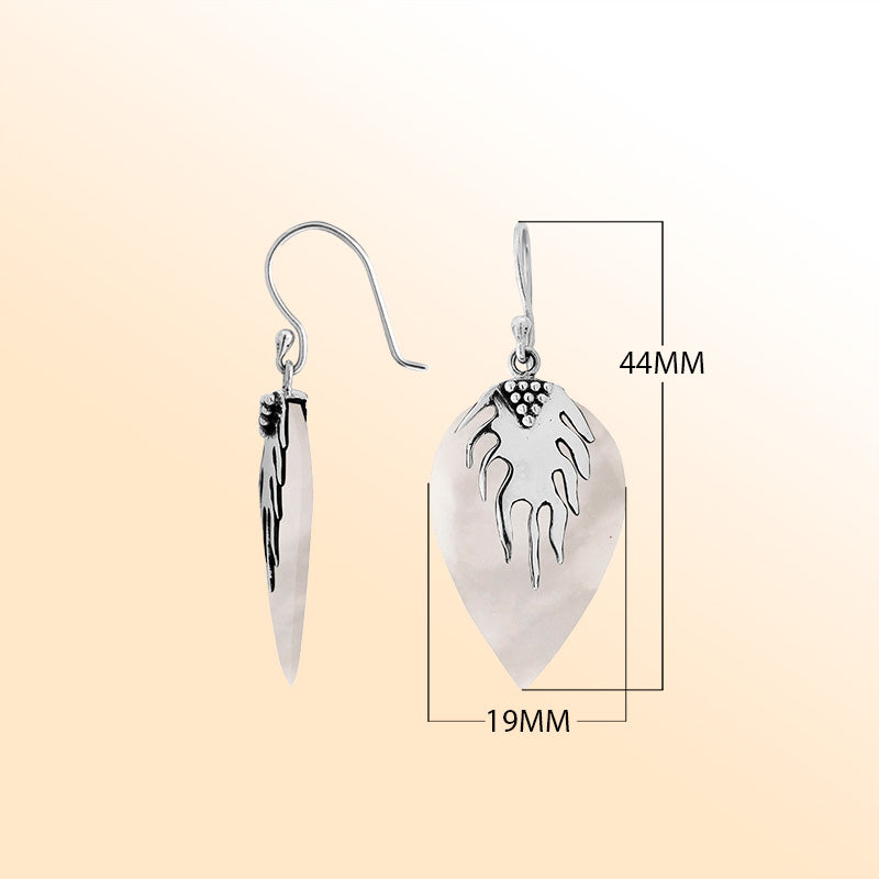 Artisan sterling silver leaf earrings with glowing Mother Of Pearl and polished handcrafted detailing.