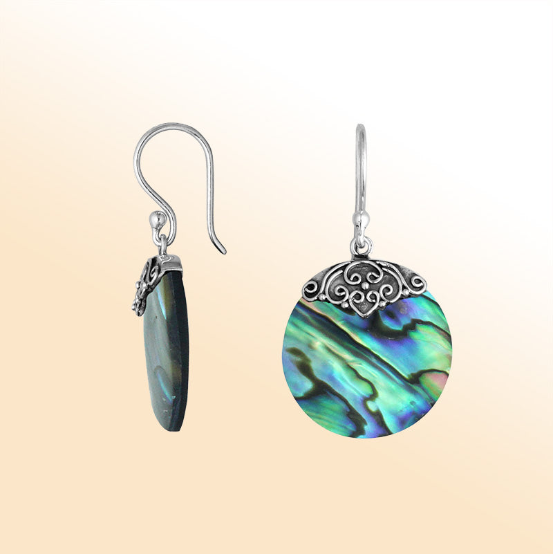 Artisan sterling silver round earrings showcasing luminous Abalone Shell with polished handcrafted detailing.