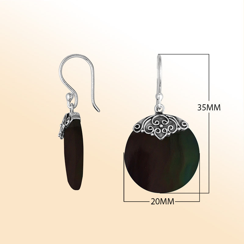 Artisan sterling silver round earrings featuring deep Black Shell with polished handcrafted detailing.