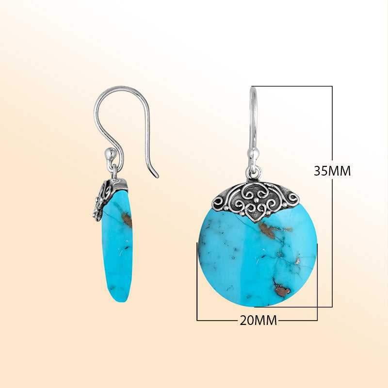 Artisan sterling silver round earrings featuring vivid Turquoise Shell with polished handcrafted detailing.