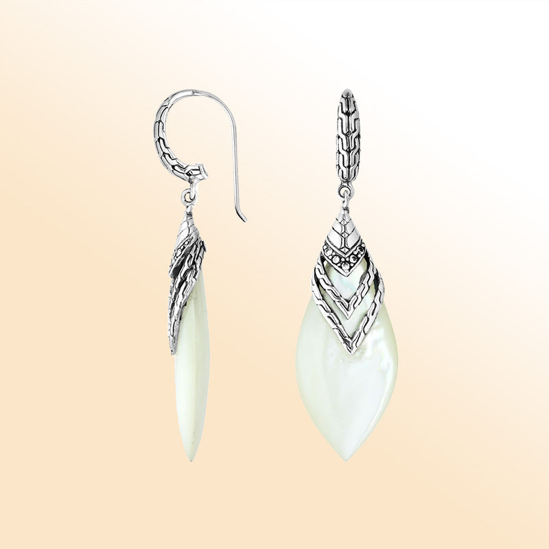 Artisan sterling silver layered leaf earrings with luminous Mother Of Pearl and sparkling Cubic Zirconia accents.