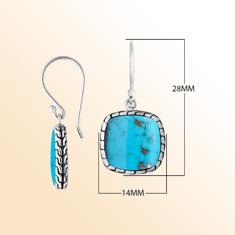 Artistic cushion earrings with Turquoise Shell and silver textured edging