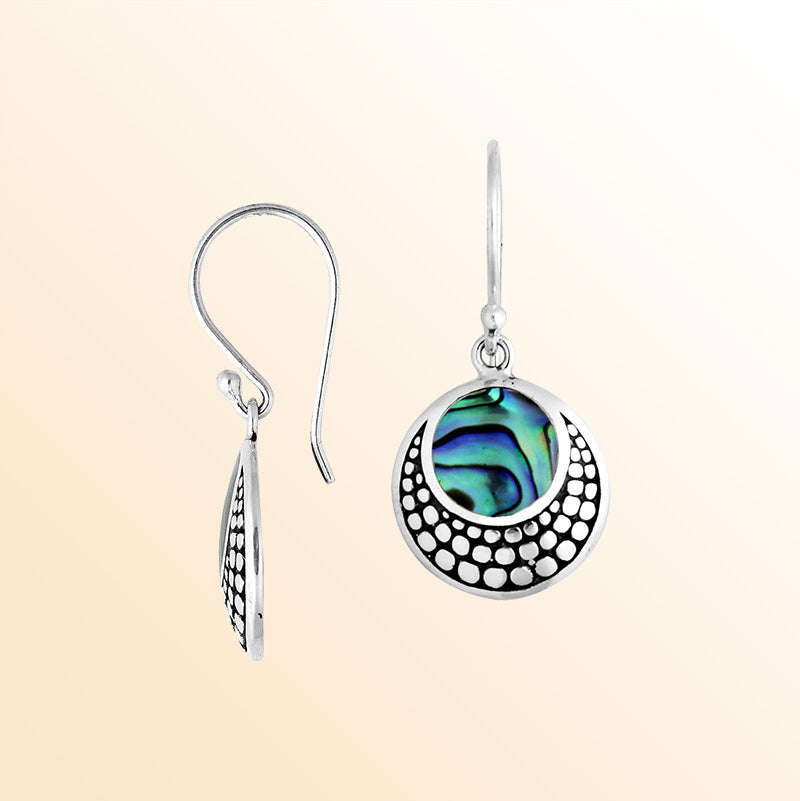 Sterling silver earrings with round Abalone Shell inlay and dotted silver pattern.