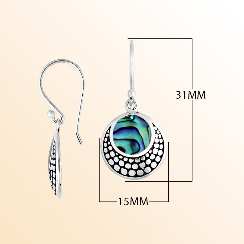 Sterling silver earrings with round Abalone Shell inlay and dotted silver pattern.
