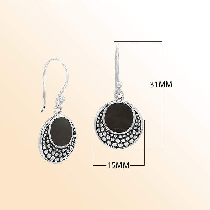 Sterling silver earrings with round Black Shell inlay and dotted silver detailing.