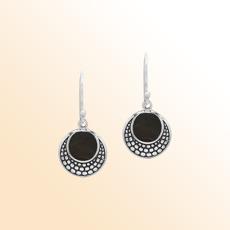 Sterling silver earrings with round Black Shell inlay and dotted silver detailing.