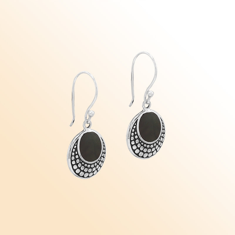 Sterling silver earrings with round Black Shell inlay and dotted silver detailing.