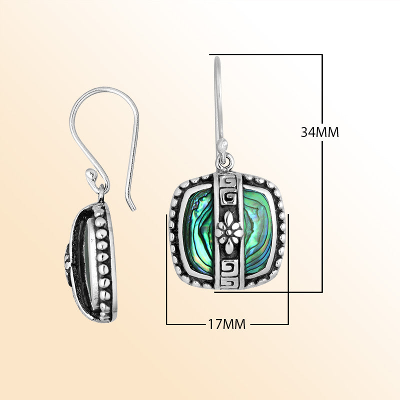 Sterling silver earrings with Abalone Shell inlay and floral geometric silver detailing.