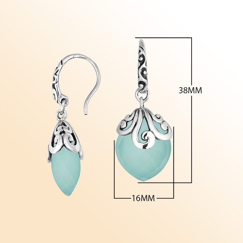 Sterling silver earrings with Green Chalcedony Quartz teardrop design and ornate silver detailing.