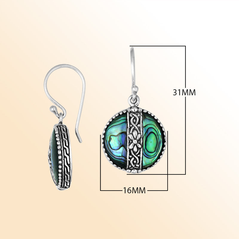 Sterling silver earrings with Abalone Shell round design and floral silver detailing.